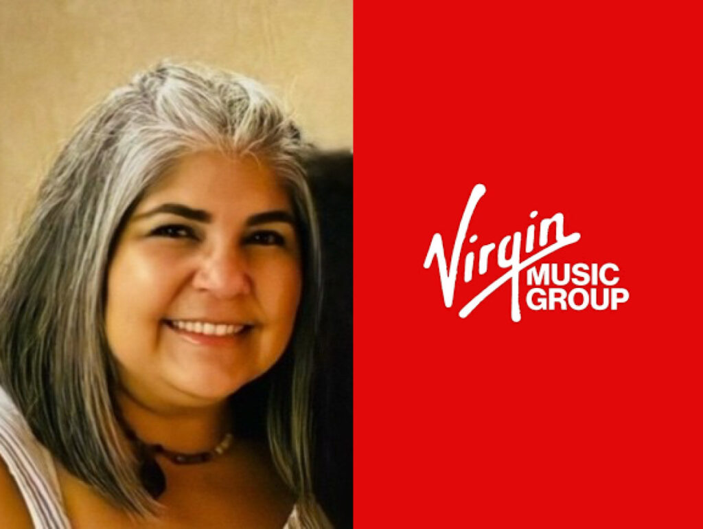 Alex Montes-Flores, VP Commercial Marketing LATAM & Iberia no Virgin Music Group celebra a promoção da executiva Sabrine Cruz